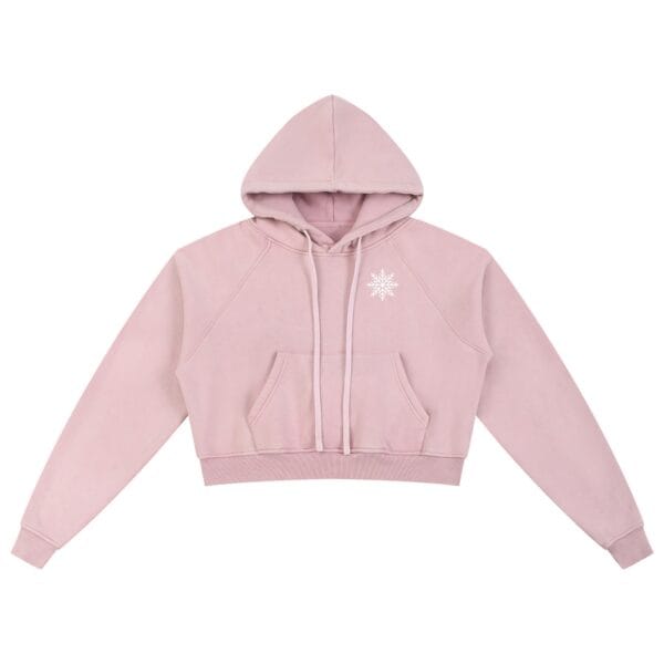 Close-up of the snowflake logo on the chest of the Snowfall Cropped Hoodie