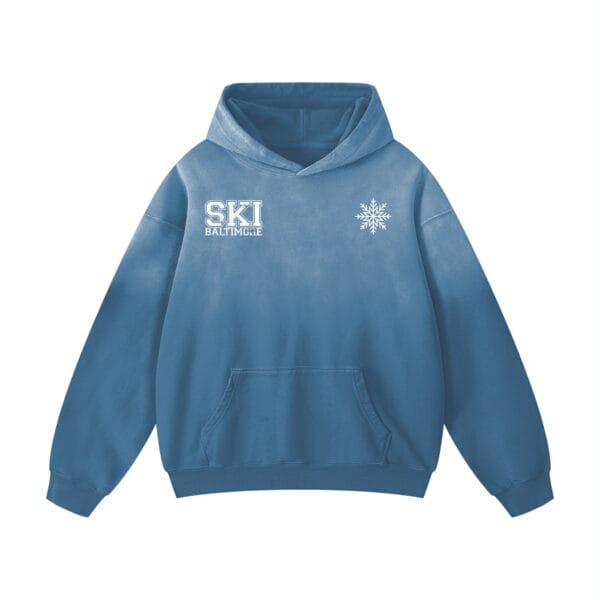 Detail of the Bigger Motion Hoodie's statement graphic and vintage wash finish