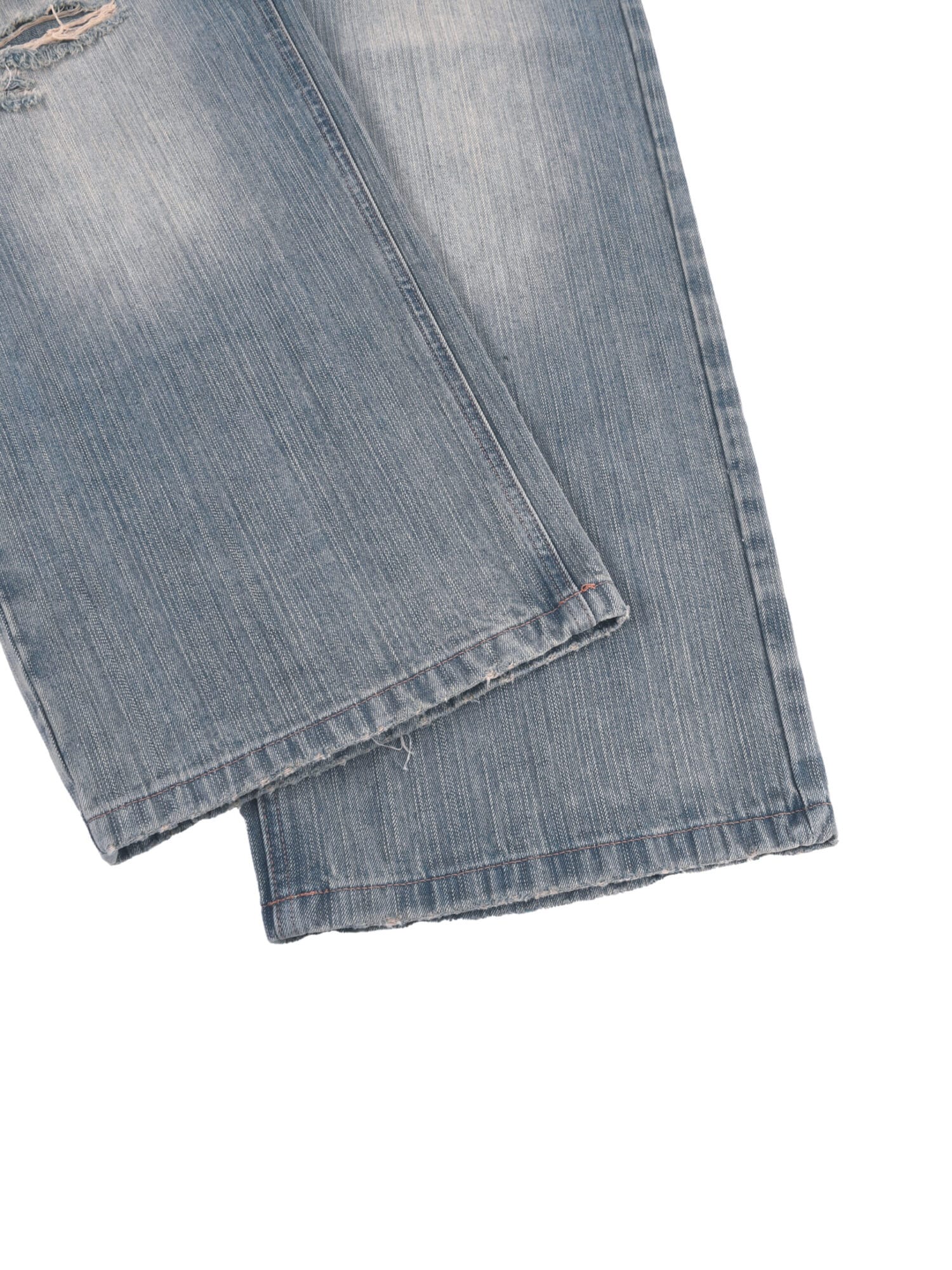 Close-up detail of the blue denim on Ski Baltimore's Denim 04 bottoms