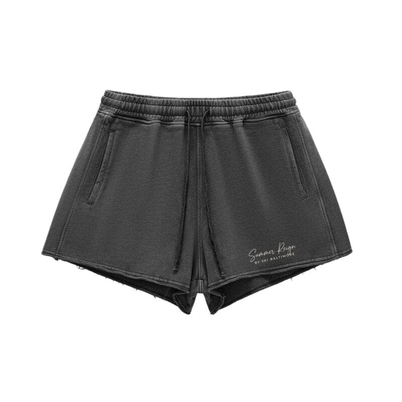 The Runway Short in black snow-washed cotton with a raw-edge hem and adjustable drawstring waist