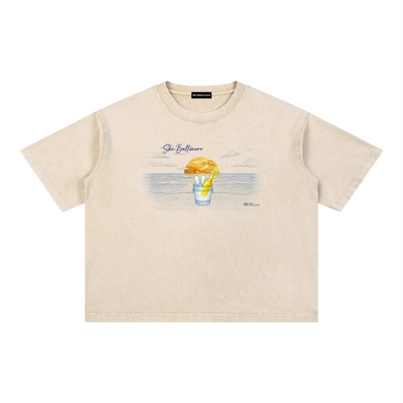 The Horizon Tee in Light Apricot, a 100% cotton t-shirt with a coastal sunset-over-the-water print