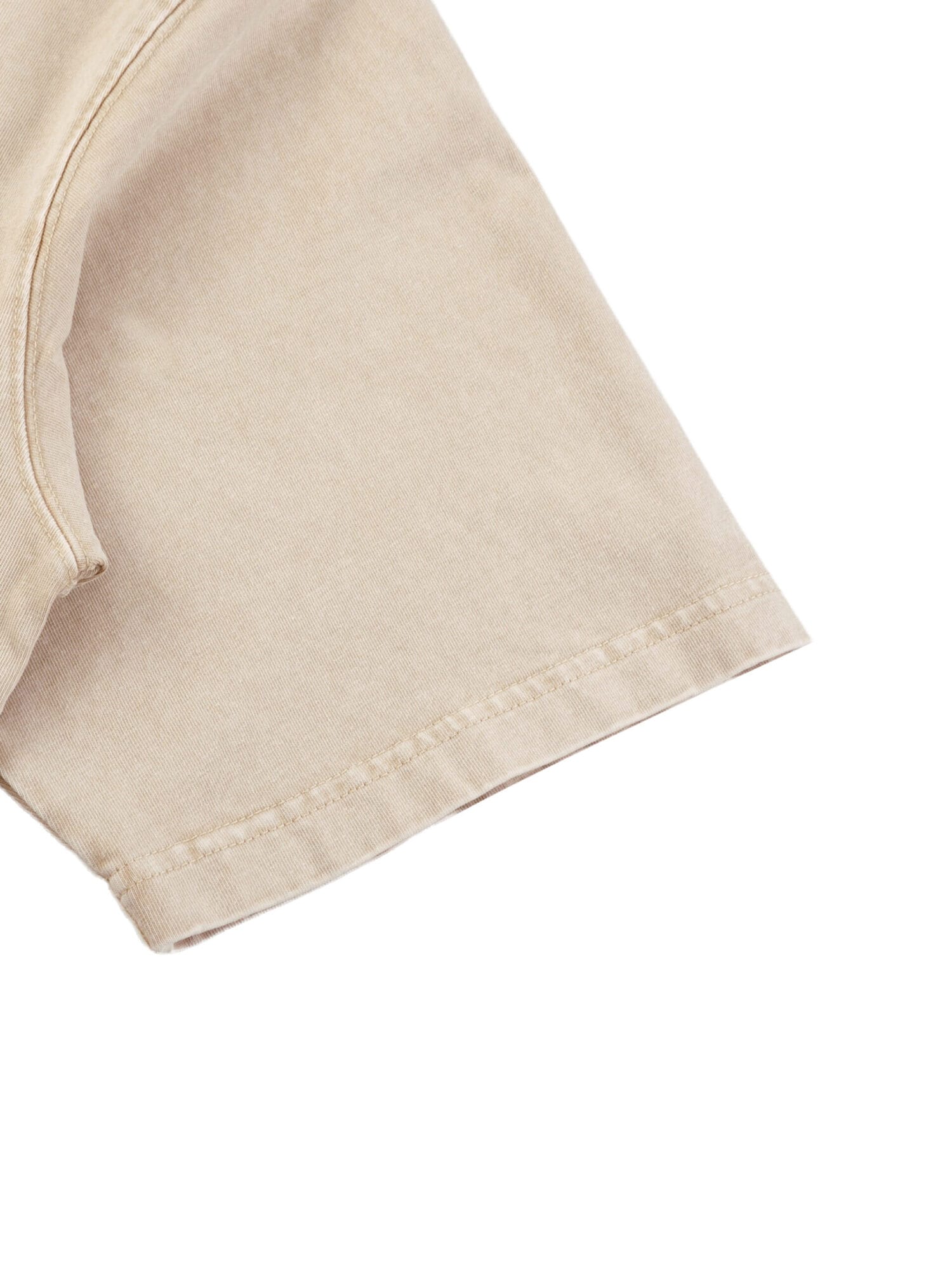 Close-up of the coastal evening sunset print on The Horizon Tee in Light Apricot